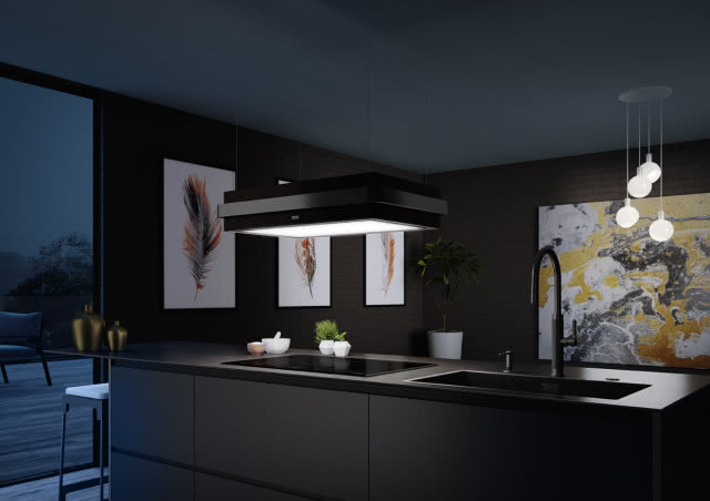 Okap Mythos Masteriece z detalem w antracycie, który pasuje do pozostałych urządzeń na wyspie kuchennej