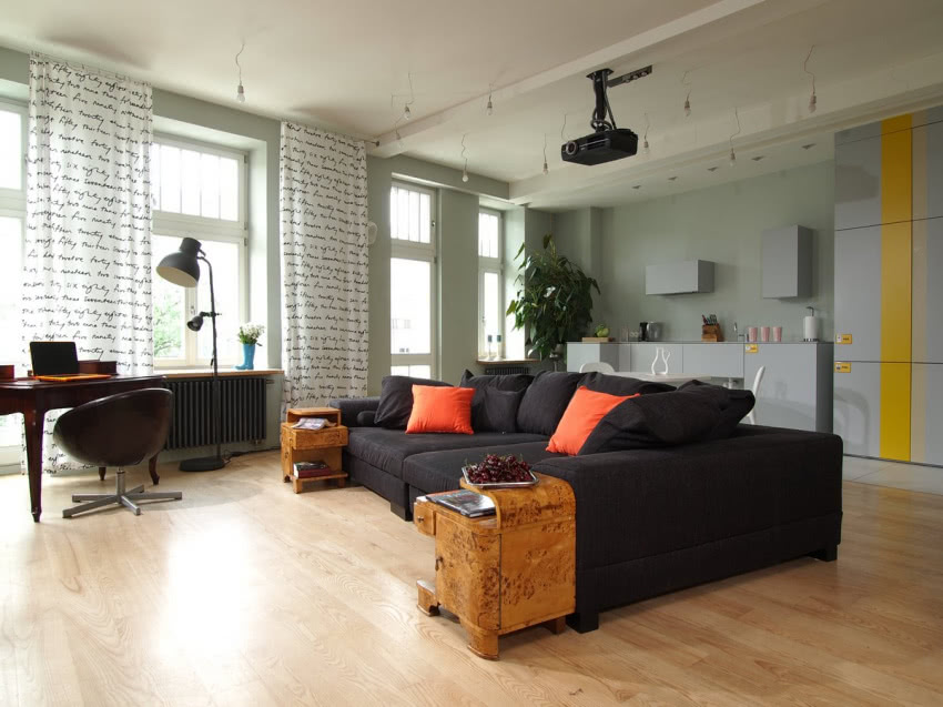 Przestrzeń dzienna Kuchnię od salonu oddziela...