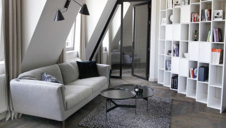 Minimalistyczne wnętrze warszawskiego poddasza