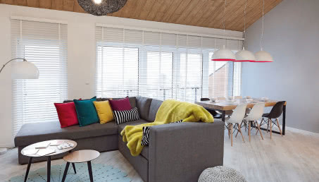 Dwupoziomowy apartament rodziny zakochanej w narciarstwie