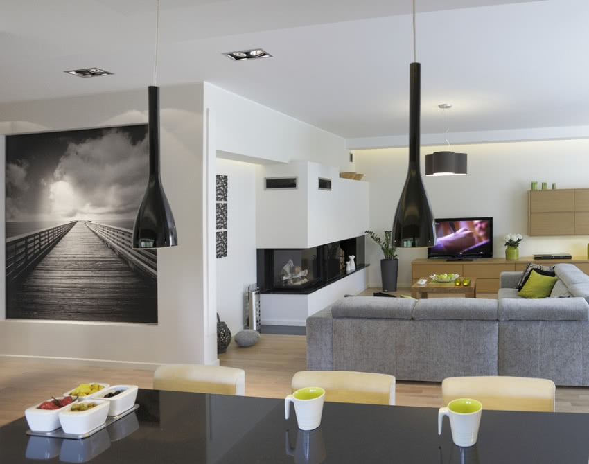 Kominek w salonie został tak zaprojektowany, aby...