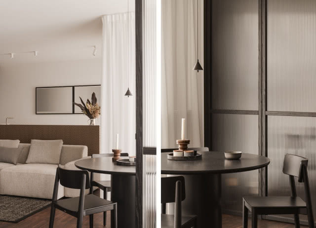 spokojne wnętrze z ciemnymi meblami