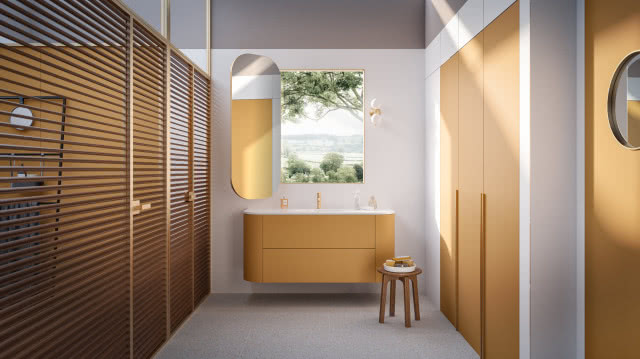 meble w kolorze kurkumy, lustro, umywalka, stołek, okno, ażurowe drzwi pod prysznic