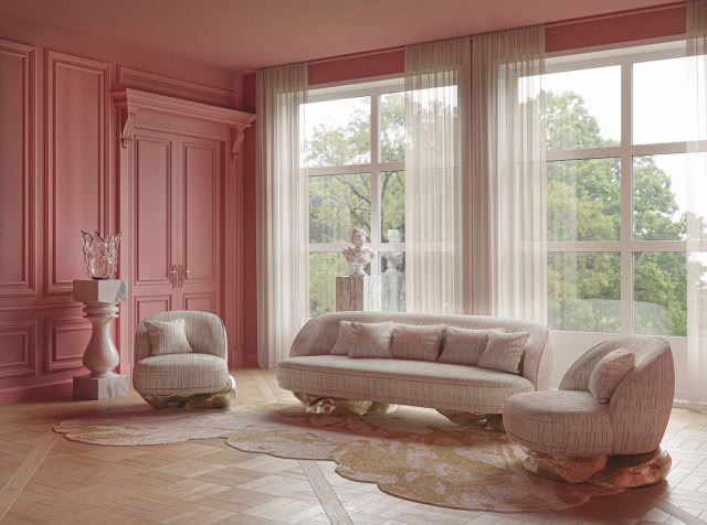 Różowa i miękka sofa w prążki