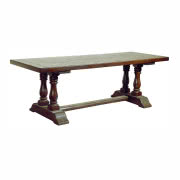 Drewniany stół na rzeźbionej podstawie