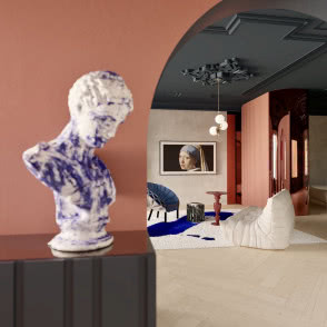 komoda, rzeźba, jodełka na podłodze, łuki w przejściu, telewizor, kanapa, fotel, stoliki kawowe, zasłony