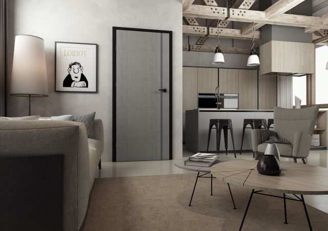 szare drzwi z czarną ościeżnicą, kanapa, okrągłe stolikikawowe, fotel, kuchnia, wyspa kuchenna, stołki barowe, lampy wiszące nad wyspą kuchenną, obraz, lampa podłogowa, dywan, belki stropowe, okap 