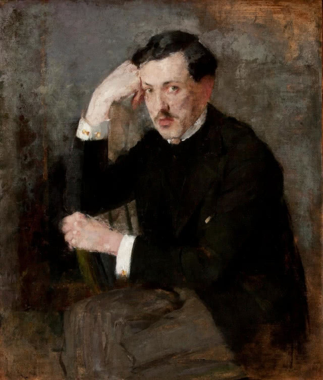 Portret mężczyzny podpierające ręka głowę