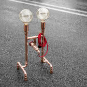 Miedź zastosowana w lampach Zapalgo występuje w...