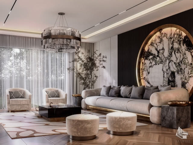 jasny, bogaty salon z sofą i pufami