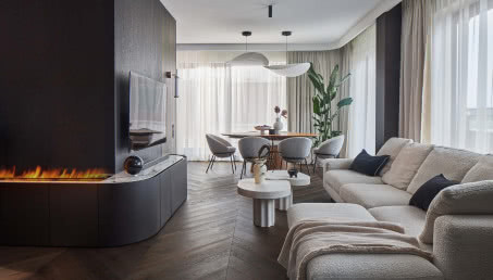 Elegancja i kontrasty w 130-metrowym apartamencie: głębokie brązy w duecie z antracytem