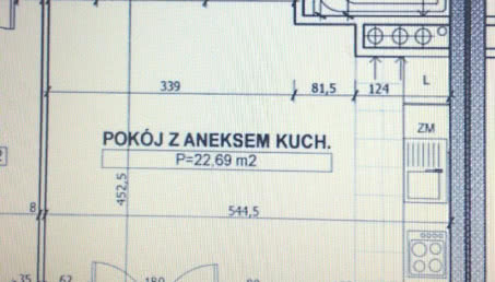 Przy której ścianie postawić w salonie tv?