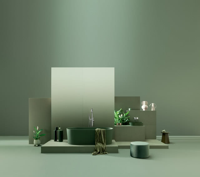 łazienka w kolorze zielonym, zielona wanna wolnostojąca, srebrna bateria wannowa, zielona umywalka nablatowa, stołek, pufa, kosmetyku, ręcznik