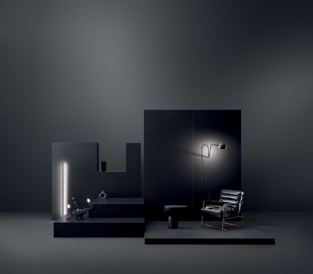 czarne meble, czarny fotel, czarny stolik kawowy, czarne oświetlenie i dodatki