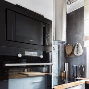 W gabinecie motyw twarzy kobiecej Fornasettiego...