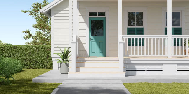 wejście, widok na turkusowe drzwi