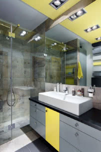 Nowoczesna łazienka w kolorze szarym i żółtym