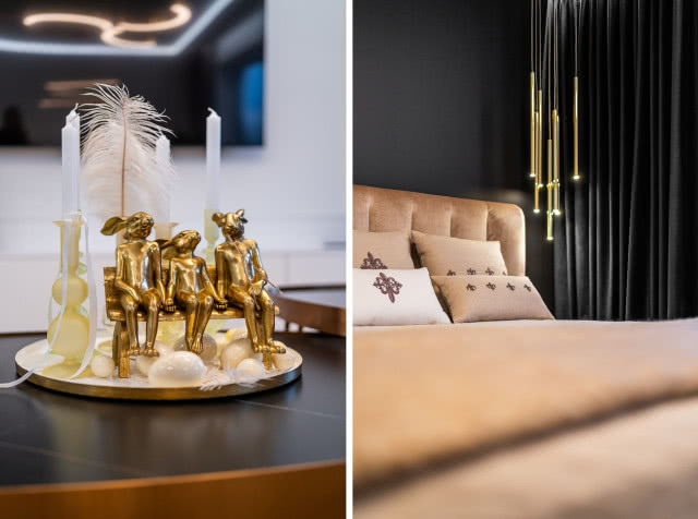 Czarna ściana w sypialni ze złotymi dodatkami