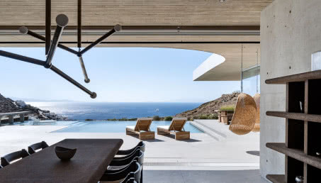 Dom zaprojektowany zgodnie z ukształtowaniem terenu! Frapująca rezydencja na wyspie Mykonos
