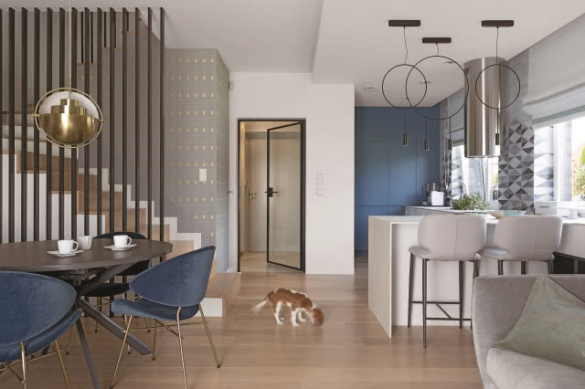 aranżacja kuchni z wyspą i stołem jadalnianym