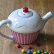 Kolorowy kubek-muffinka w zestawie z pokrywką i...