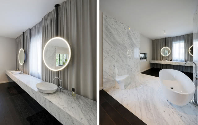 Duża łazienka z marmurowym blatem 