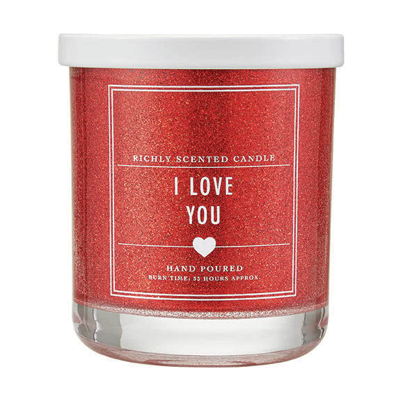 czerwona świeca w słoiczku