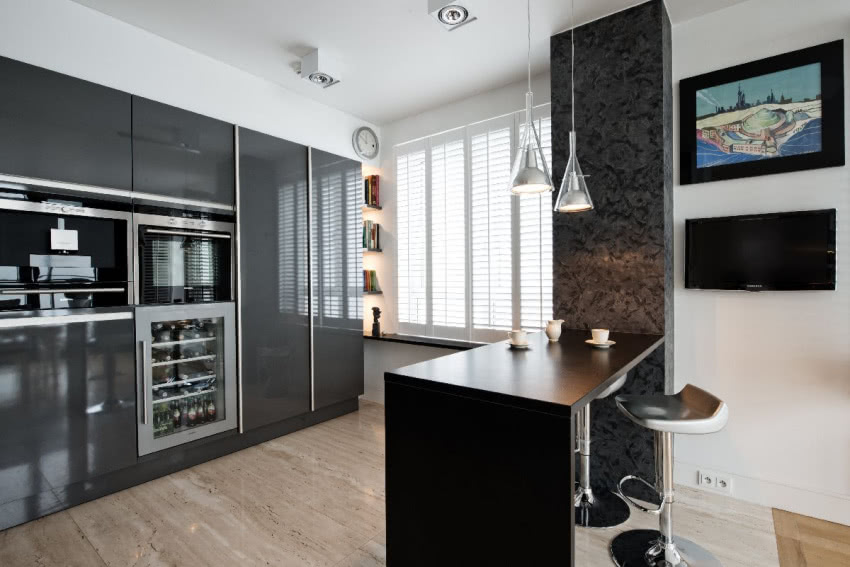 Dopełnieniem grafitowych frontów kuchennych są...