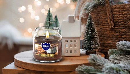 Poczuj magię Świąt z marką Aura - świece, które otulą Twój dom zapachem i blaskiem