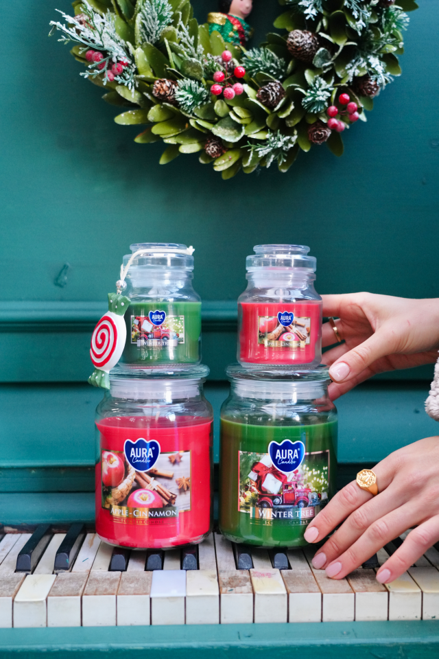 Poczuj magię Świąt z marką Aura - świece, które otulą Twój dom zapachem i blaskiem