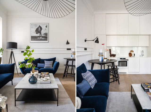 Salon ze sztukaterią i granatową kanapą