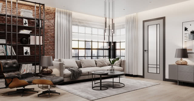 cegła na ścianie, metalowe półki na książki, fotel, kanapa, stolik kawowy, lampa obraz, dywan, oświetlenie sufitowe