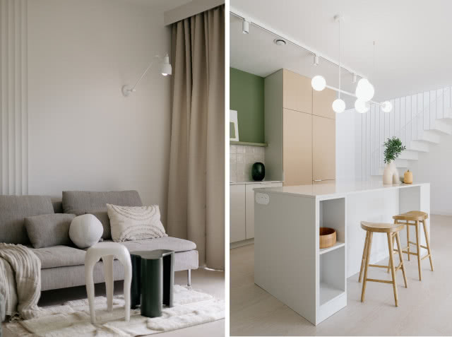 biały salon z drewnianą kuchnią z zielonymi frontami