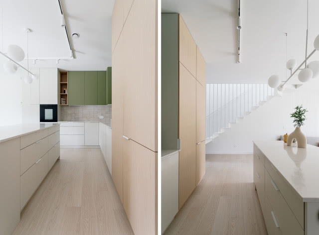 biała kuchnia z drewnem i zielenią