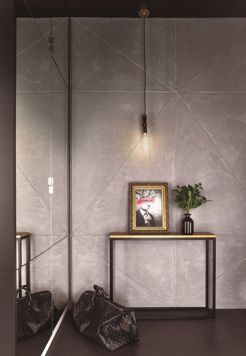 Betonowe ściany podkreślają
loftowy charakter...