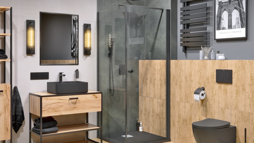 W industrialnej łazience jasne drewno ociepla...