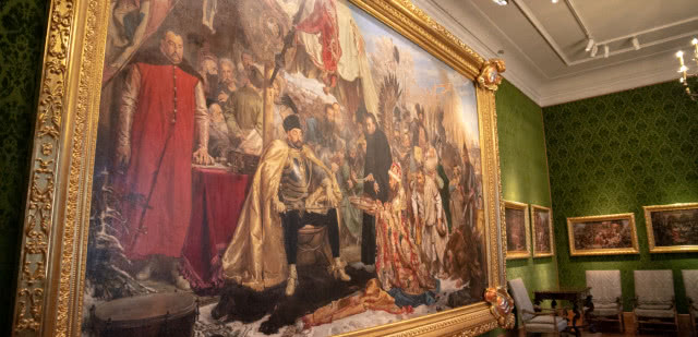 obraz, siedzący król w sobolowym futrze przyjmuje hołd