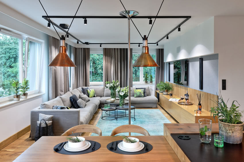 Modułowa kanapa Sits, stoliki Etnicraft
i dywan...