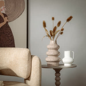 4 triki na przytulne wnętrze - odkryj jak za pomocą tekstyliów urządzić w domu ciepły zakątek na chłodne dni