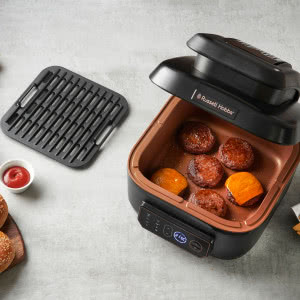 Frytkownica beztłuszczowa czy urządzenie wielofunkcyjne na gorące powietrze - co wybrać?