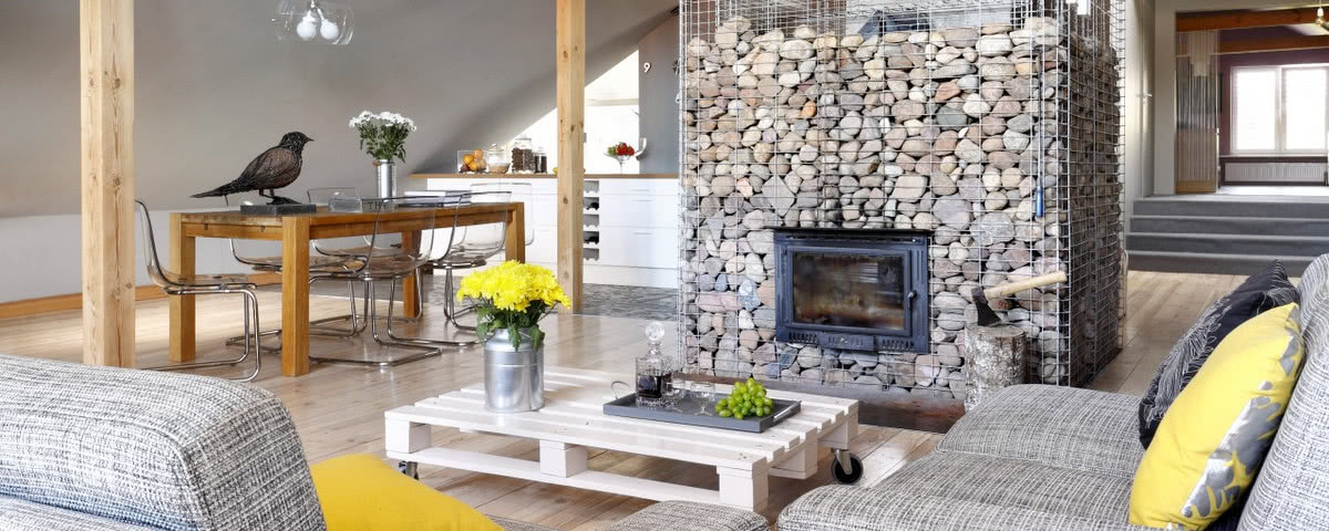 Kamień i drewno - mieszkanie na poddaszu