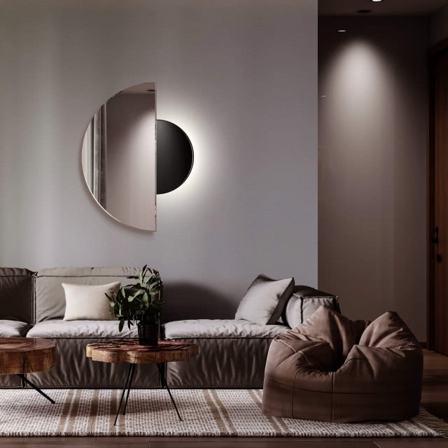 Inspirowane wyglądem księżyca w różnych jego fazach lustro podświetlane LUNA to intrygująca dekoracja ścienna.  Fot. GieraDesign