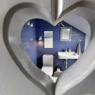 Kamień i drewno - mieszkanie na poddaszu