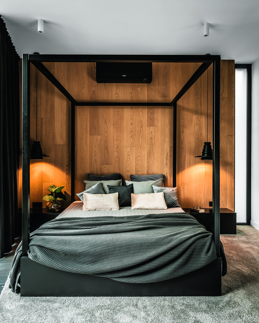 Drewniana okładzina ściany nawiązuje kolorem
do...