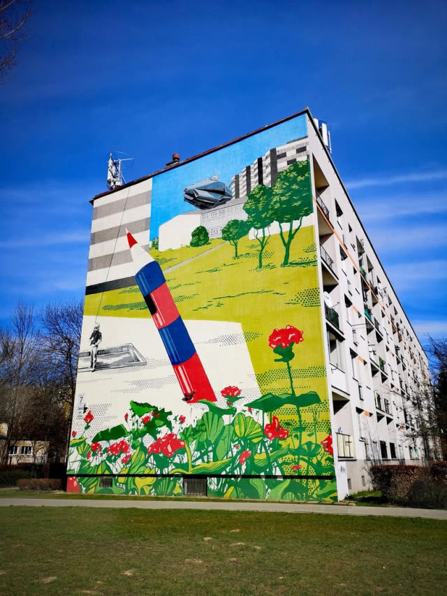 mural z ołówkiem na trawie blok w Krakowie