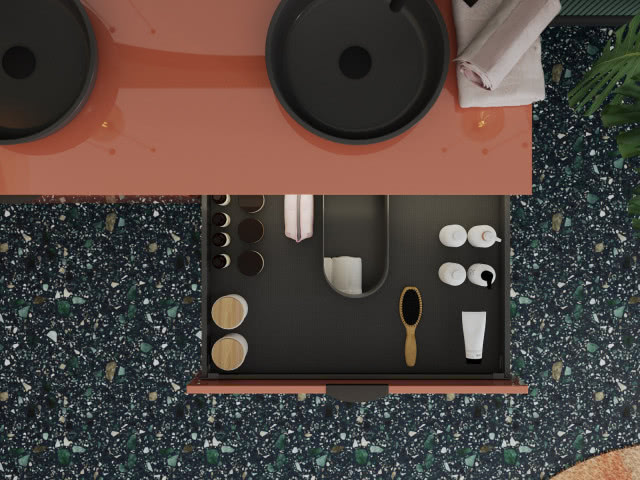 osłonka na syfon, szuflady łazienkowe, przybory toaletowe, dwie czarne okrągłe umywalki