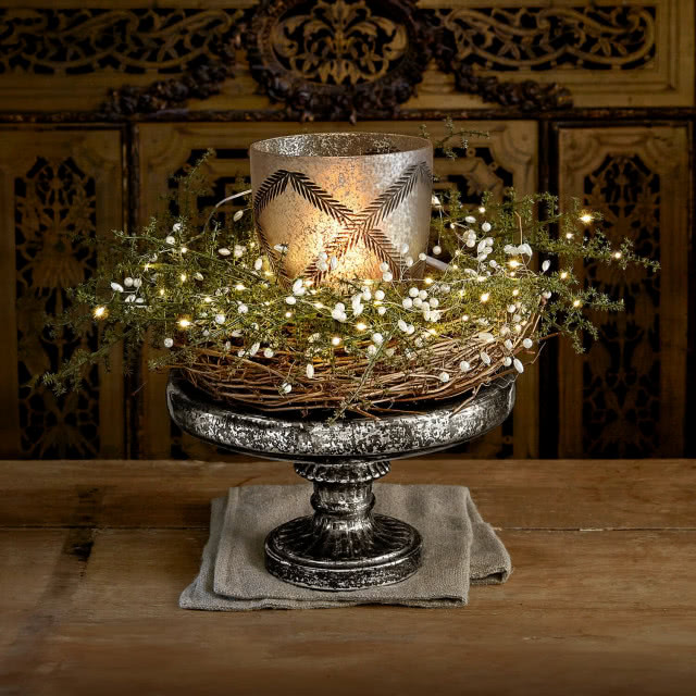 patera ze świecą i lampkami LED