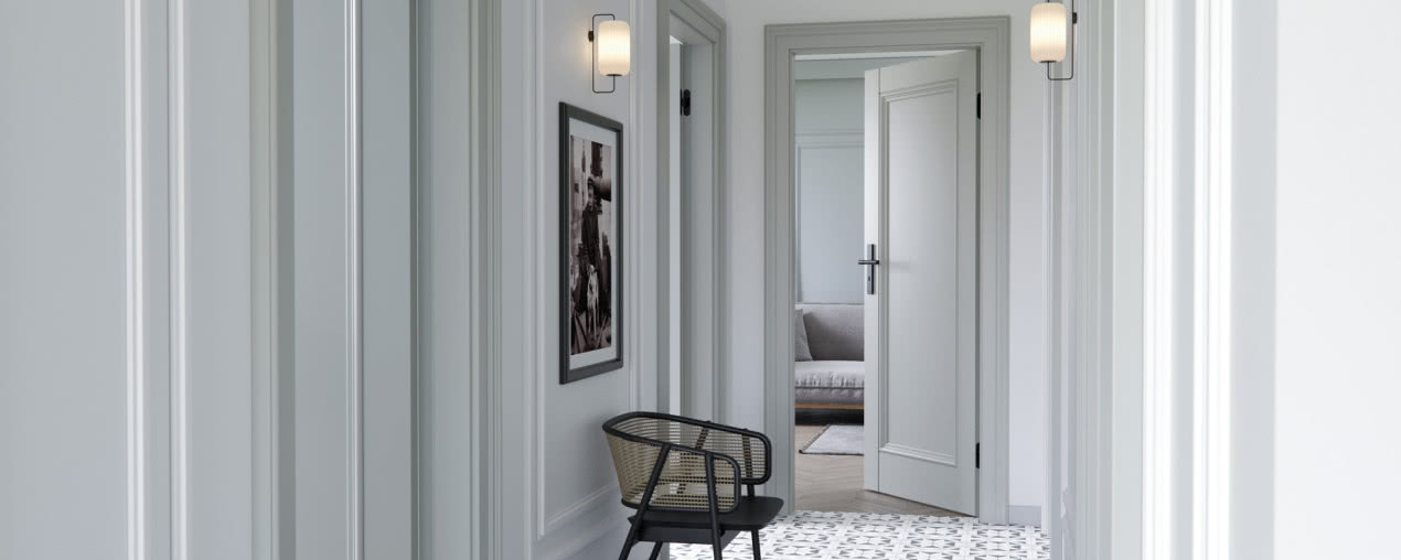 Jakie wykończenia drzwi kreują atmosferę przytulności we wnętrzu?