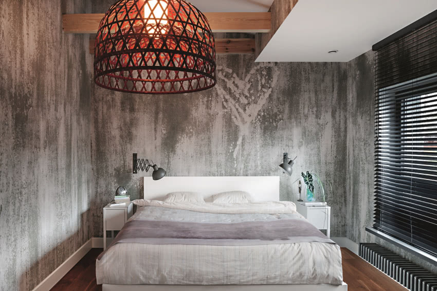 Surowe wnętrze przełamane designerskimi...