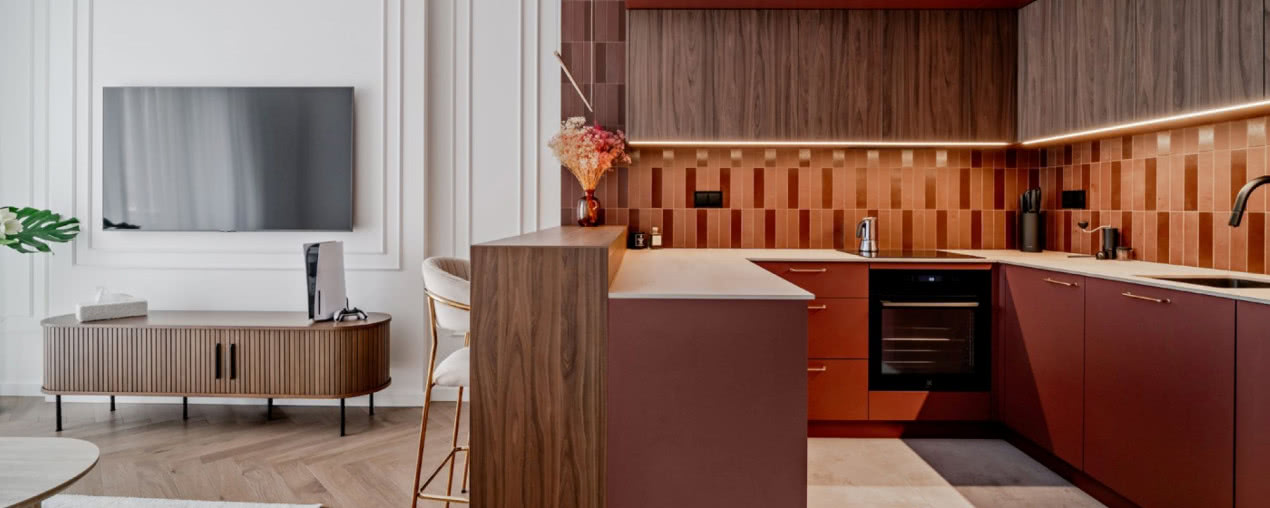 Mieszkanie w Warszawie - wnętrza w burgundowym kolorze inspirowane stylem modern classic 